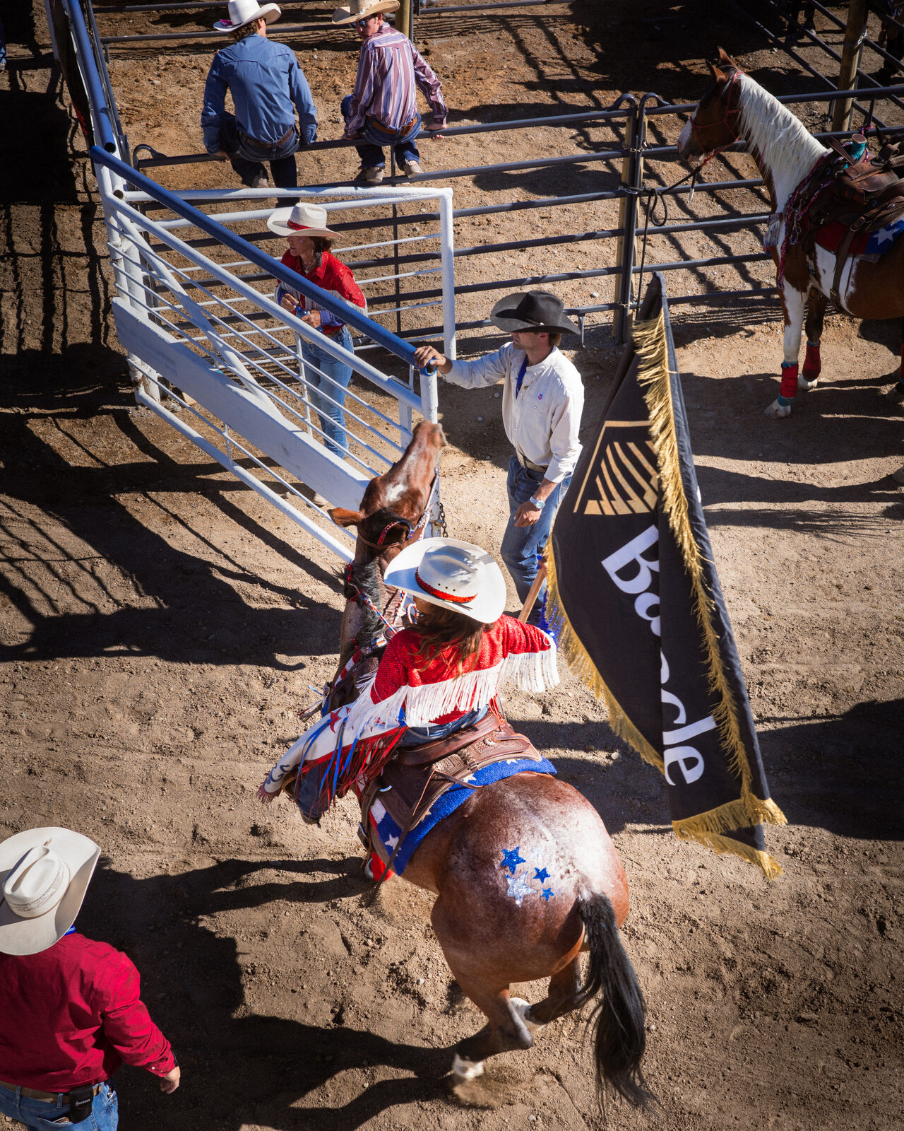 A rodeo queen on horseback, from above